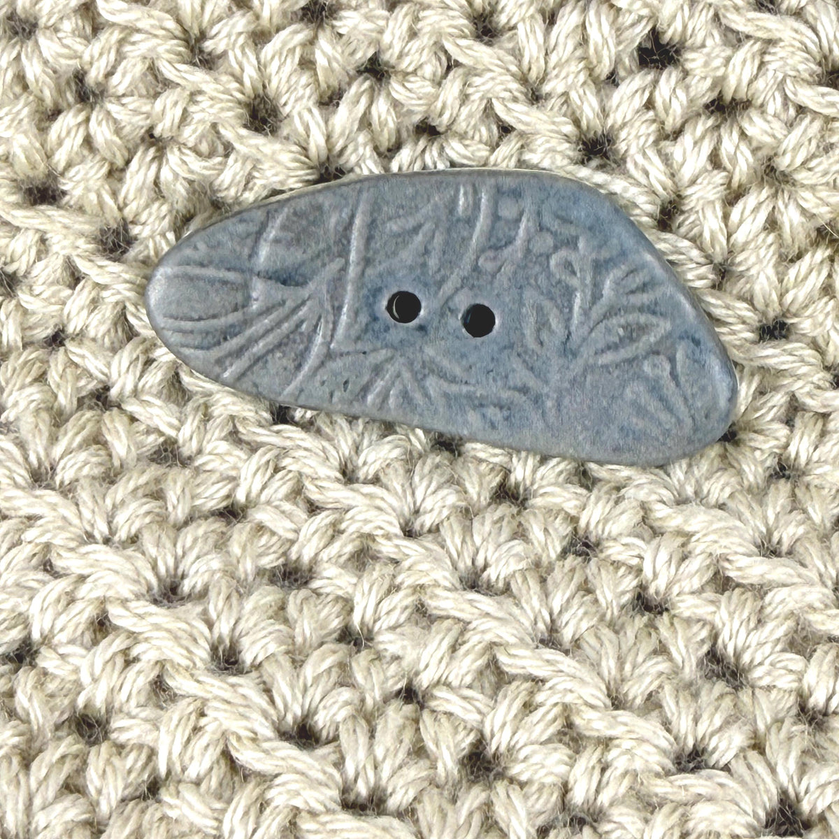 Blue Matte Triangular Button with Flower and Plant Texture