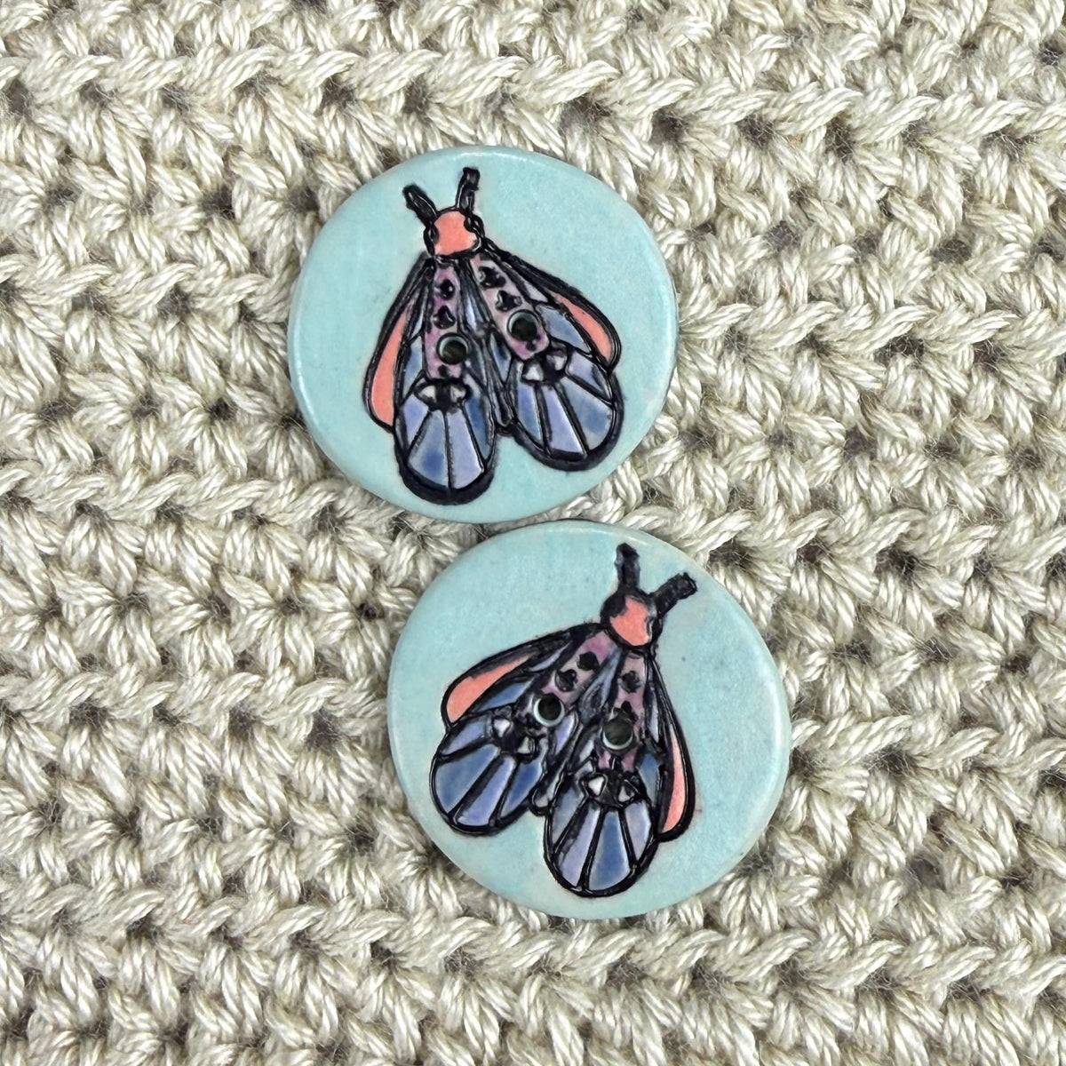 Blue Moth with Eyes on Aqua Blue Ceramic Button