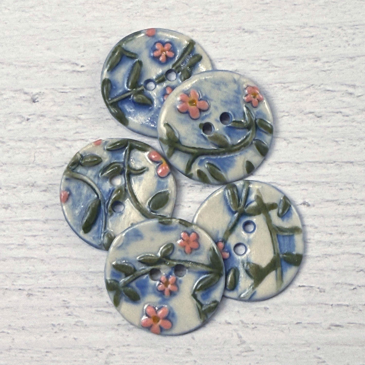Pink Flowers on White and Blue Buttons