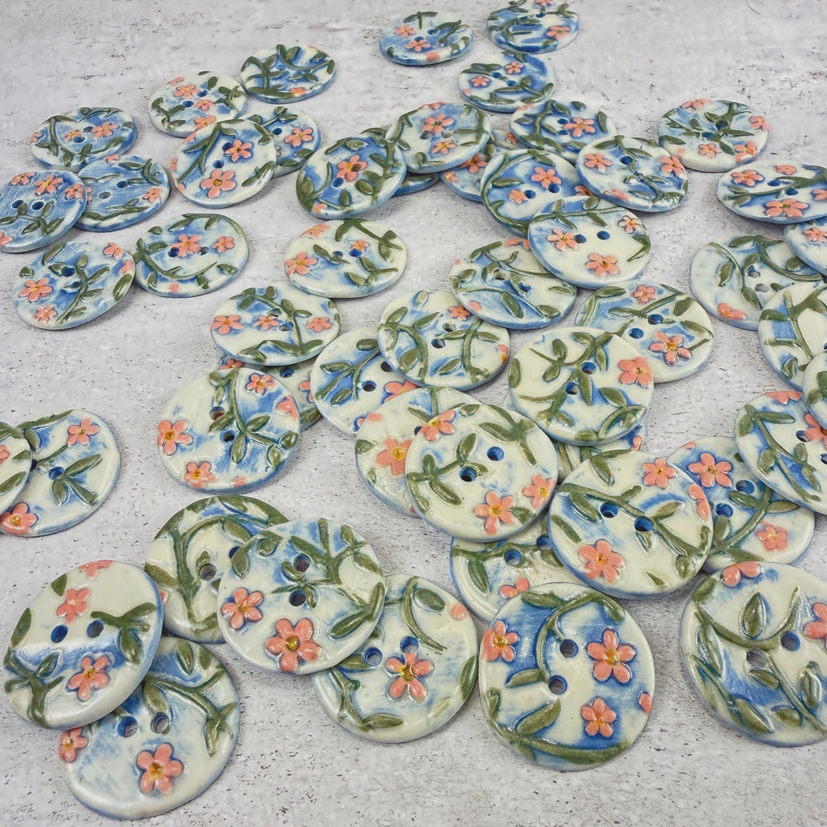 Pink Flowers on White and Blue Buttons