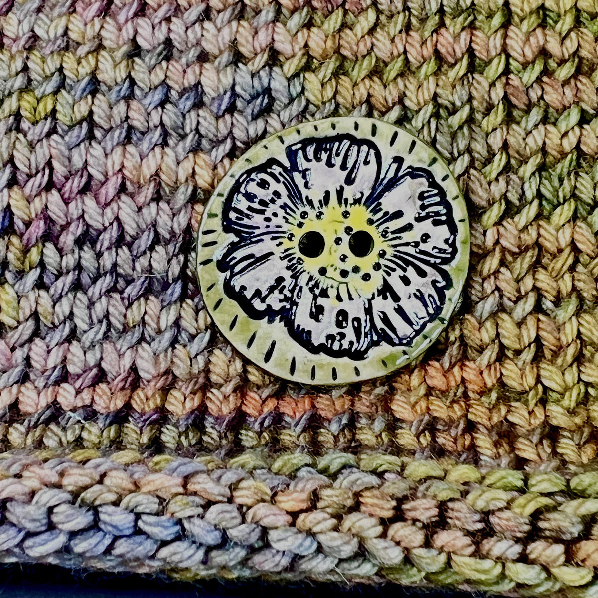 Large Button with Light Lavender Flower and Green Border