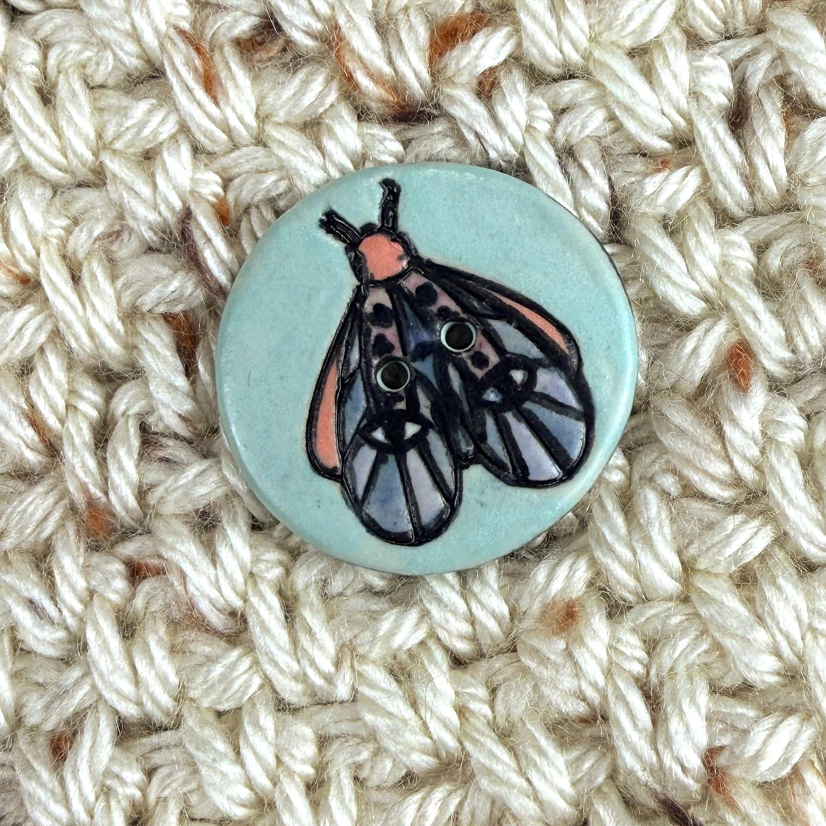 Blue Moth with Eyes on Aqua Blue Ceramic Button
