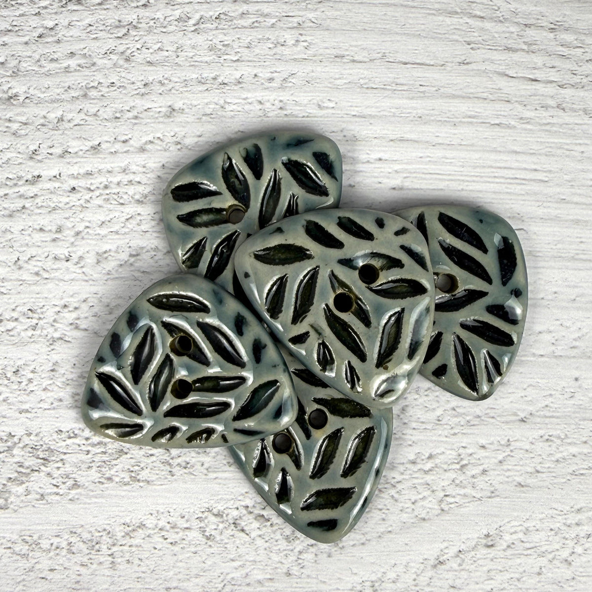 Triangular Shaped Buttons in Light Sage with Dark Sage Leaf Pattern