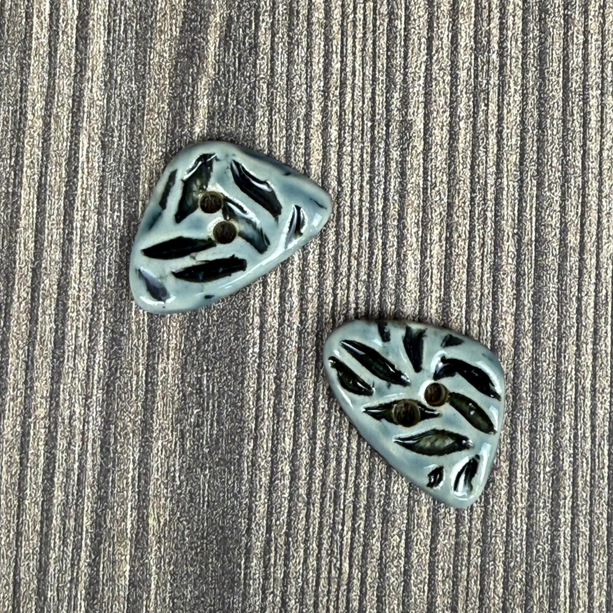 Small Triangular Shaped Buttons in Light Sage with Dark Sage Leaf Pattern