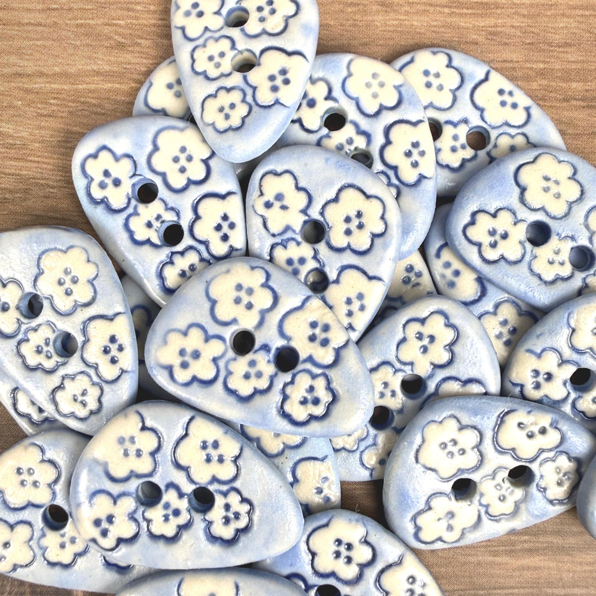 Set of 5 Small Blue Triangular Shaped Buttons with White Flowers