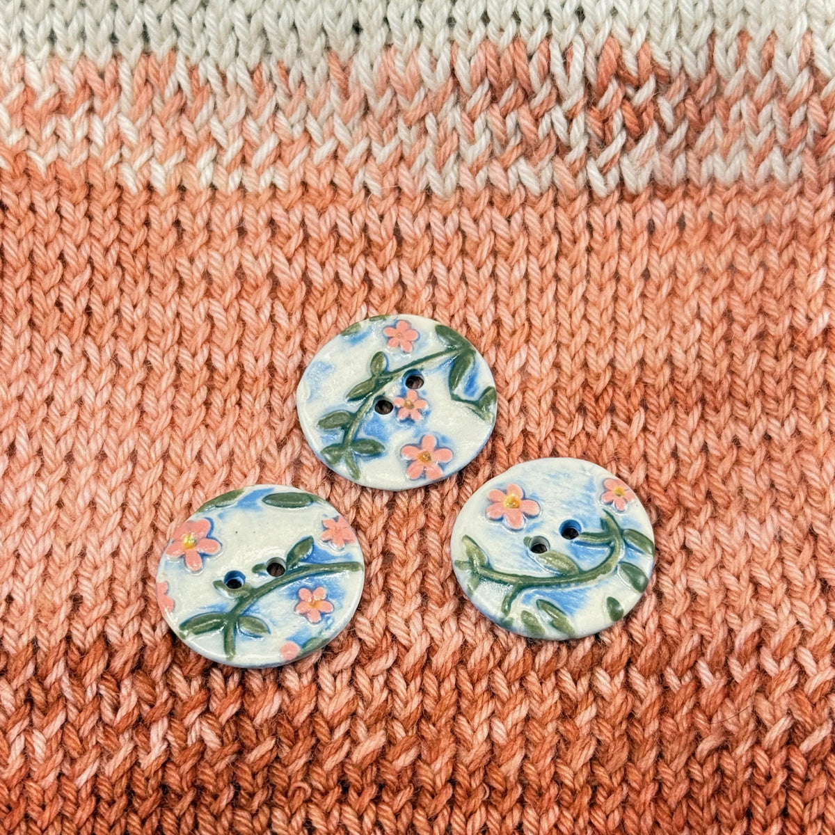 Pink Flowers on White and Blue Buttons