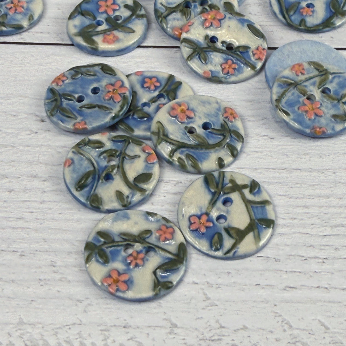 Pink Flowers on White and Blue Buttons