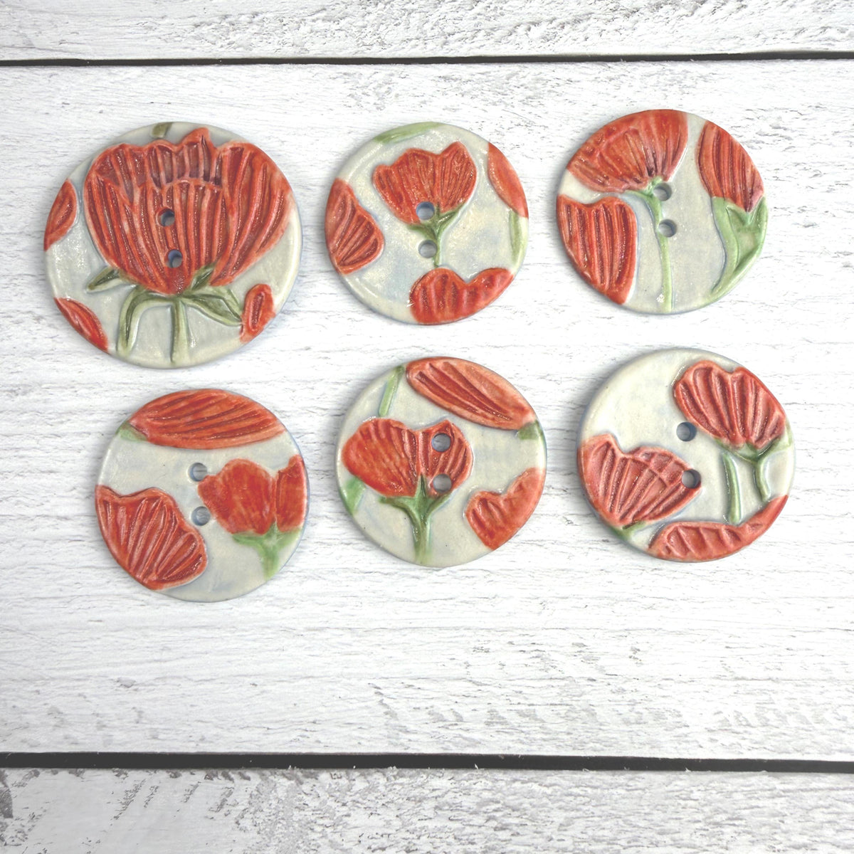 Bright Red Poppies on Blue Round Buttons
