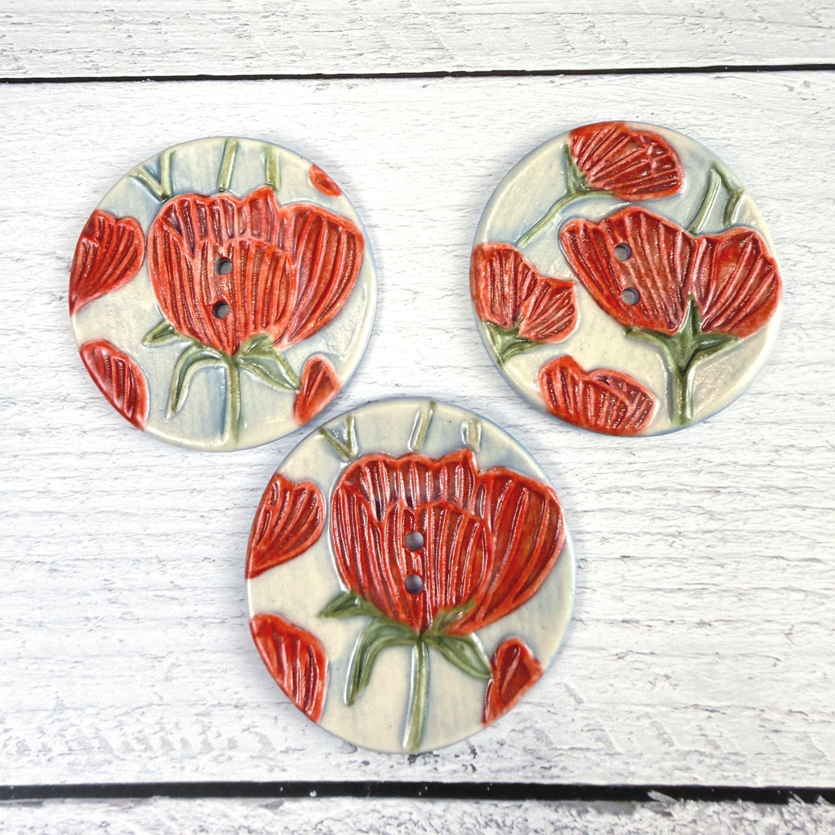 Bright Red Poppies on Blue Round Buttons