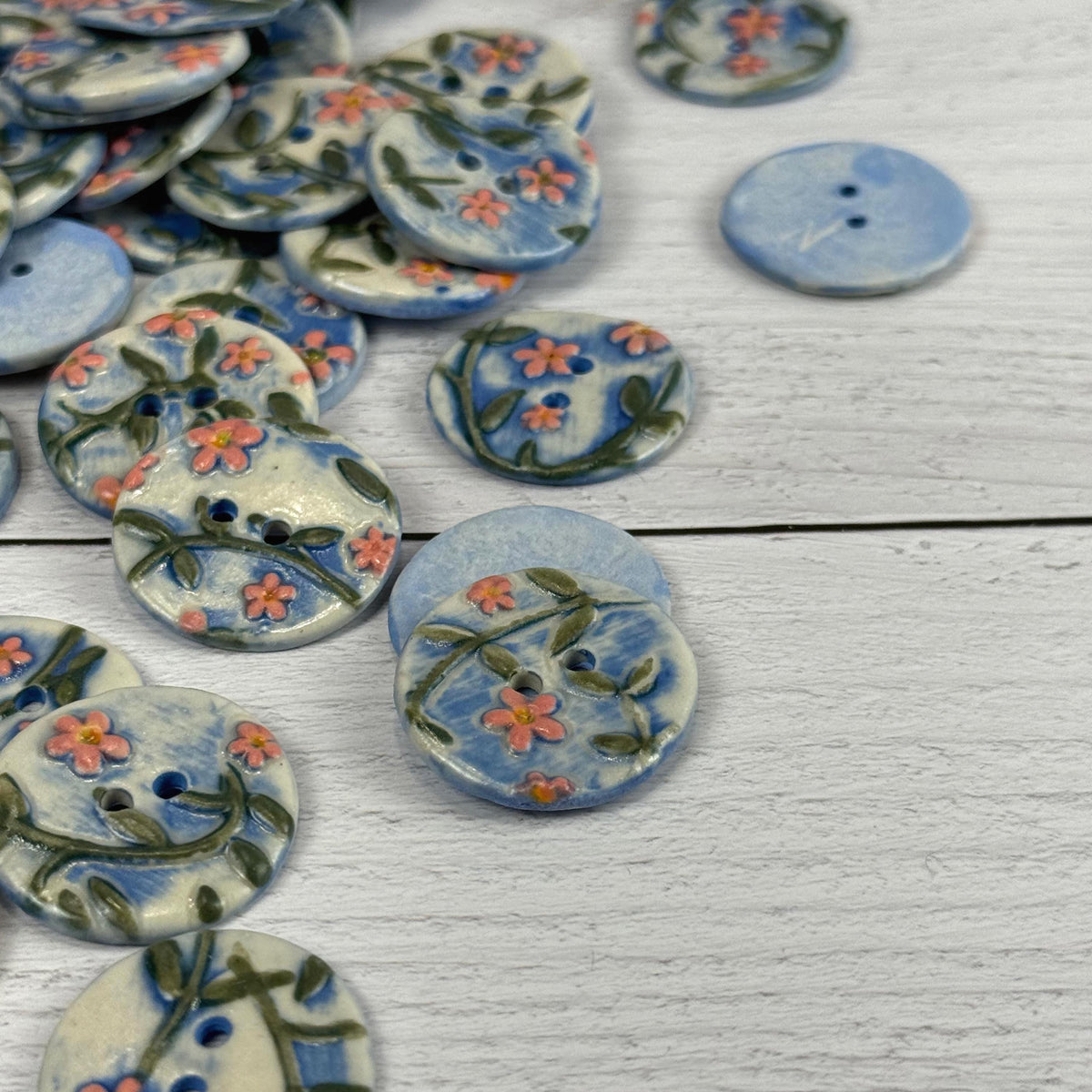 Pink Flowers on White and Blue Buttons