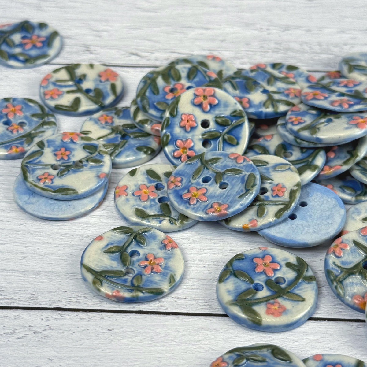 Pink Flowers on White and Blue Buttons